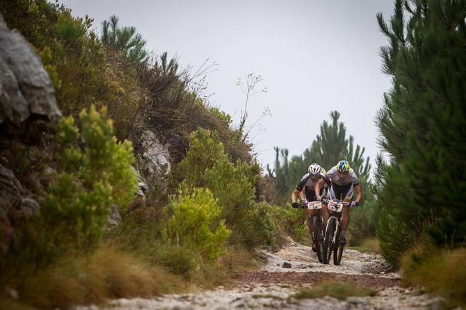 Simon Stiebjahn of Bulls 2 and Christoph Sauser of Meerendal Songo Specialized during the final stage