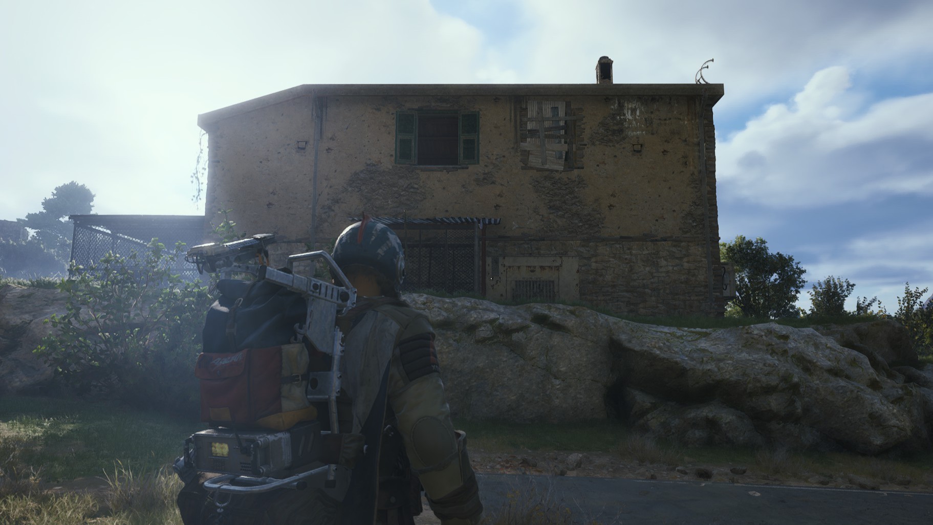 Take a photo of any farmland house around the Ruined Homestead.