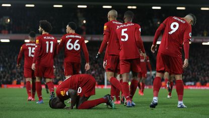 Liverpool striker Sadio Mane celebrates his 81st-minute winner against West Ham