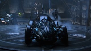 Val Kilmer next to his Batmobile in Batman Forever