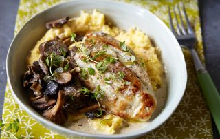 Mushroom truffle sauce with chicken and cheesy polenta