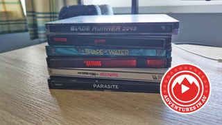 A stack of 4K Blu-ray steelbook cases