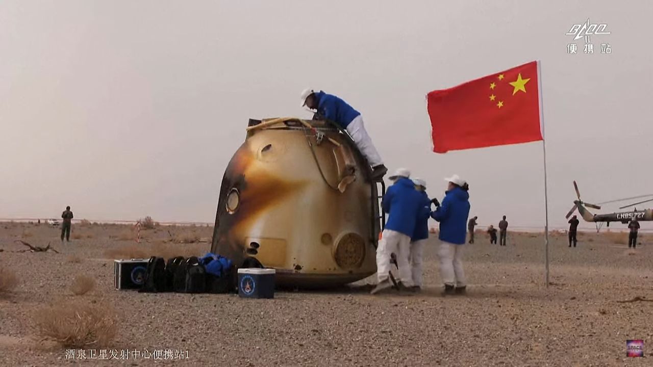 Recovery teams work to retrieve China's Shenzhou 13 astronaut crew after their successful landing.