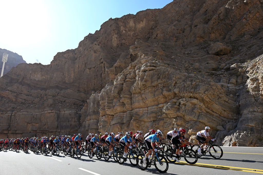 JEBEL JAIS UNITED ARAB EMIRATES FEBRUARY 21 Sam Bennett of Ireland and Team DecathlonAG2R La Mondiale Vegard Stake Laengen of Norway and Team UAE Emirates Sebastian Kolze of Denmark and Team Tudor Pro Cycling Ivo Oliveira of Portugal and Team UAE Emirates lead the peloton climbing to Jebel Jais 1489m during the 6th UAE Tour 2024 Stage 3 a 176km stage from Al Marjan Island Al Jazirah Al Hamra to Jebel Jais 1489m UCIWT on February 21 2024 in Jebel Jais United Arab Emirates Photo by Tim de WaeleGetty Images
