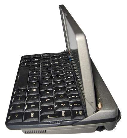 Here the 5mx is either in the process of being opened or closed. That black thing on the extreme right bottom of the case is the top of the stylus, called a