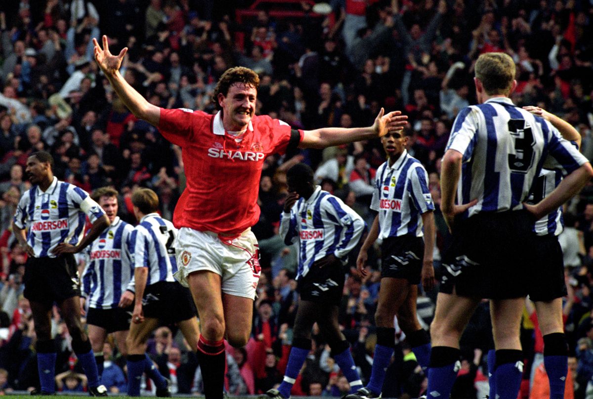 Steve Bruce celebrates after scoring the winning goal for Manchester United against Sheffield Wednesday in the Premier League match at Old Trafford, April 1993