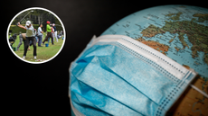 A mask on a globe, with a golfer hitting a shot