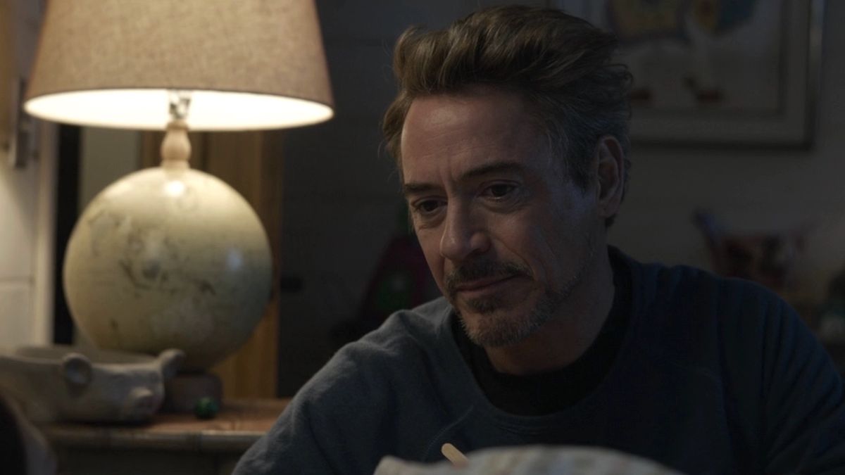 Tony Stark seated next to his daughter Morgan&#039;s bed