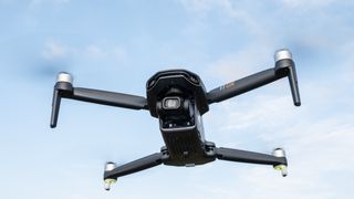 Bwine F7GIM in flight against a blue sky