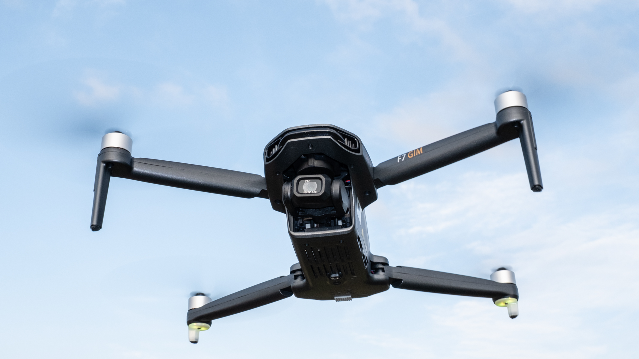 Bwine F7GIM in flight against a blue sky