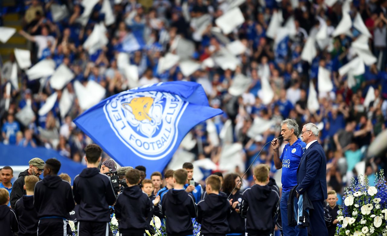 LEICESTER, ENGLAND - MAY 07:Singer Andrea Bocelli performs while Claudio Ranieri Manager of Leicester City stand next to him prior to the Barclays Premier League match between Leicester City