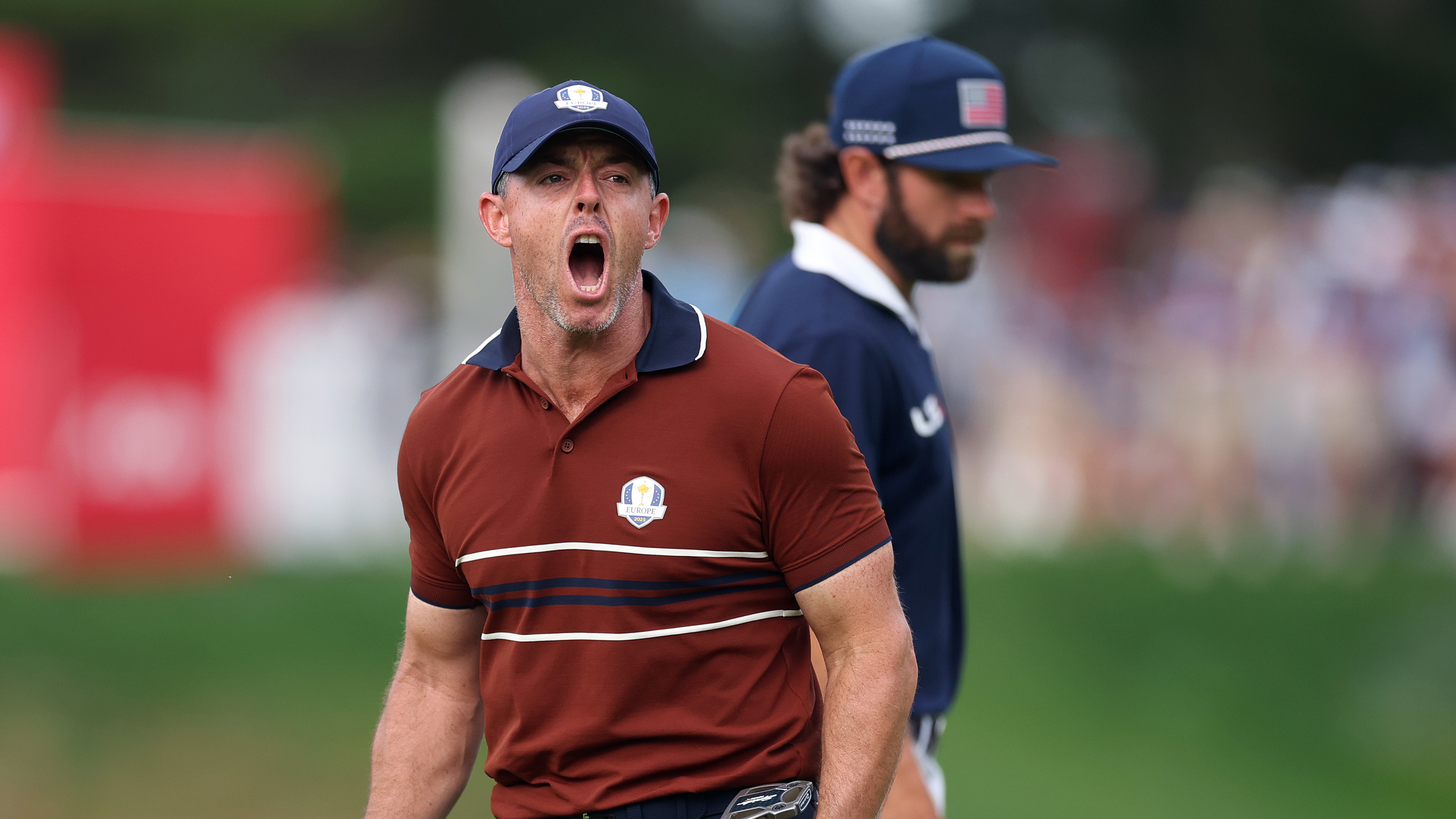 Rory McIlroy roars with delight after holing a putt in the Saturday afternoon fourball session at the 2025 Ryder Cup