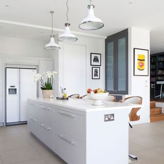 modern white kitchen with white wall and counter