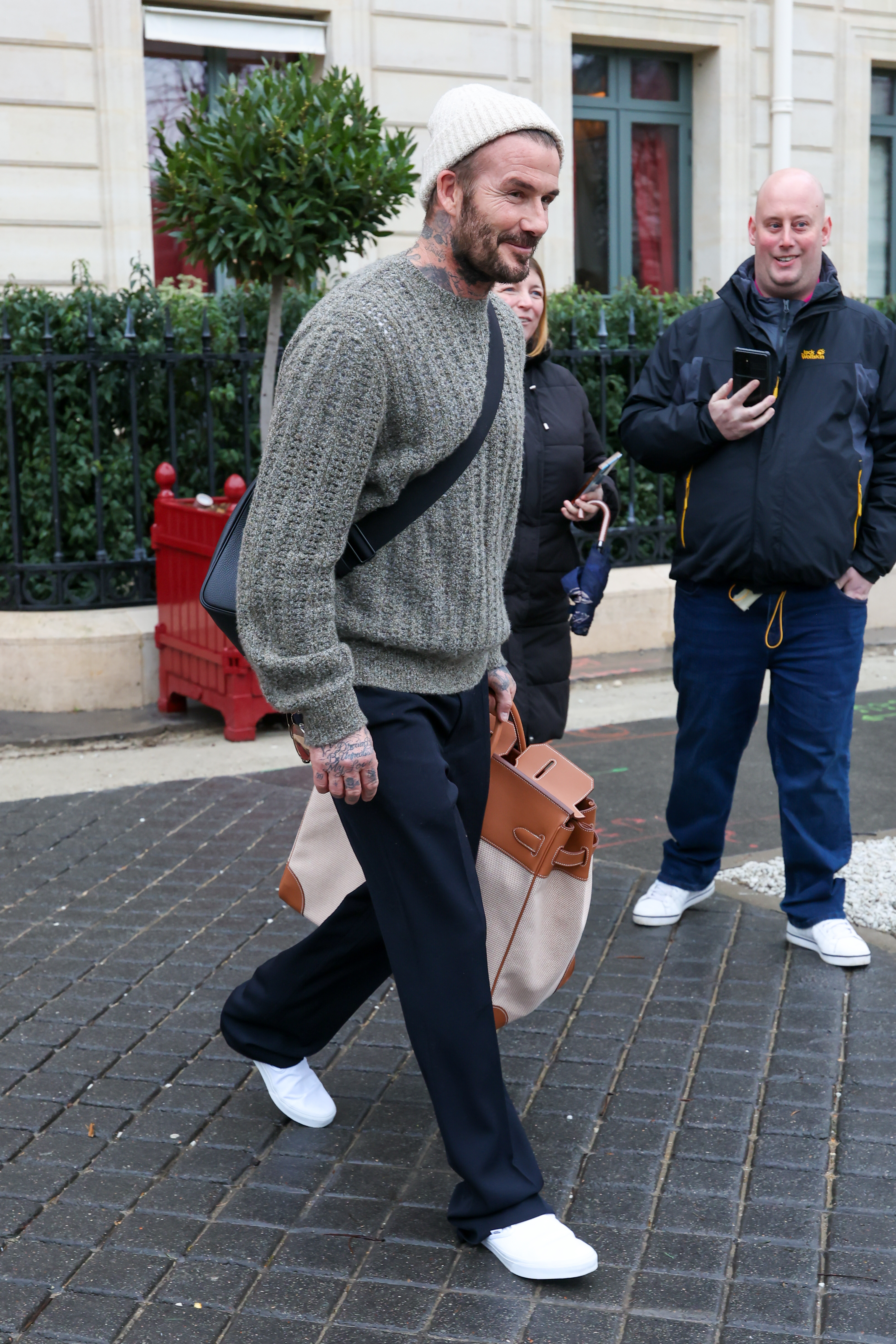 David Beckham followed Victoria's lead with an oversize Herm&amp;egrave;s Birkin bag