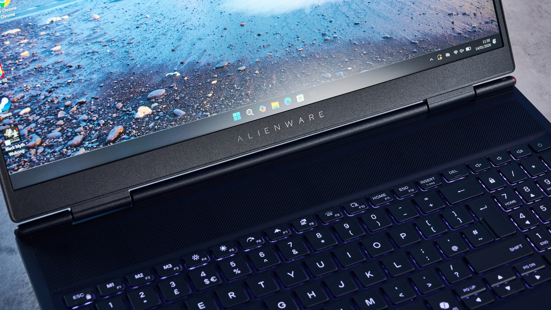 A blue Alienware 16X Aurora gaming laptop