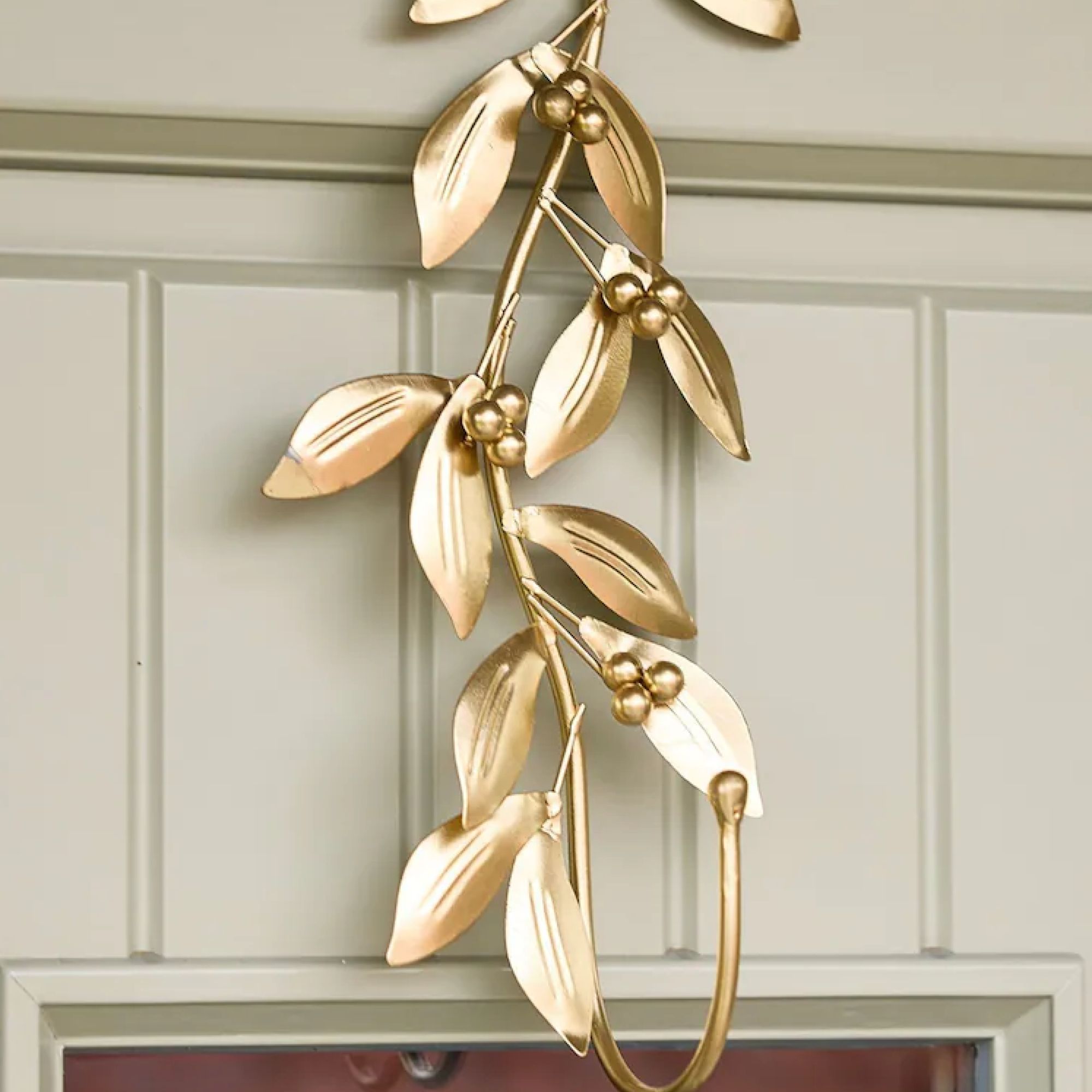 Gold botanical wreath hanger Next