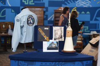 An archive of Apollo artifacts, including decals removed the Apollo 11 spacecraft, are appraised on Antiques Roadshow. 