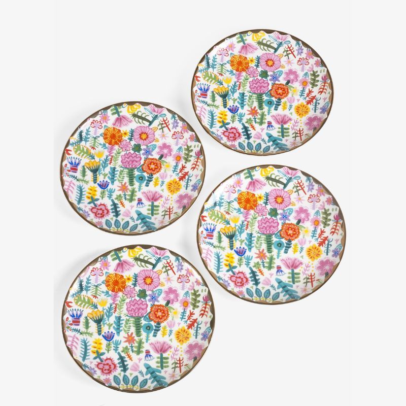 Set of four side plates with floral pattern from the NExt x Lucy tiffney collection