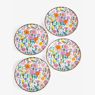 Set of four side plates with floral pattern from the NExt x Lucy tiffney collection 