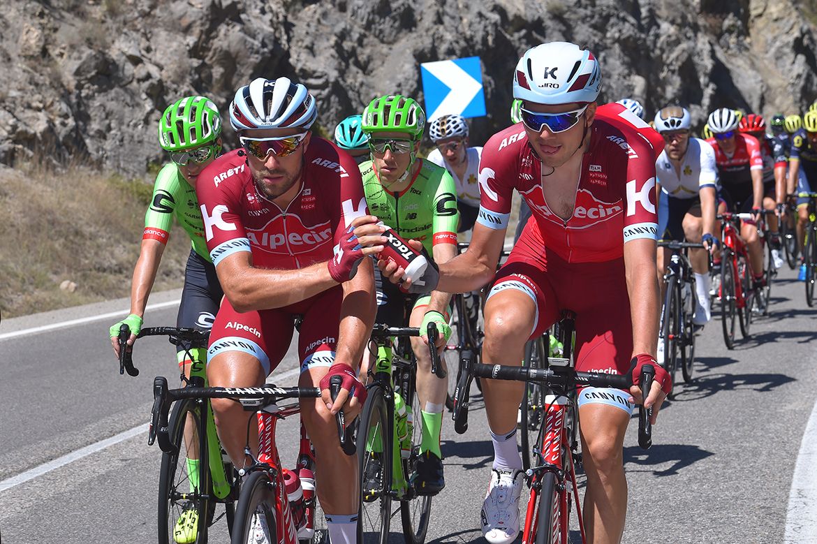 Marco Haller and Rein Taaramae share refreshments during the stage