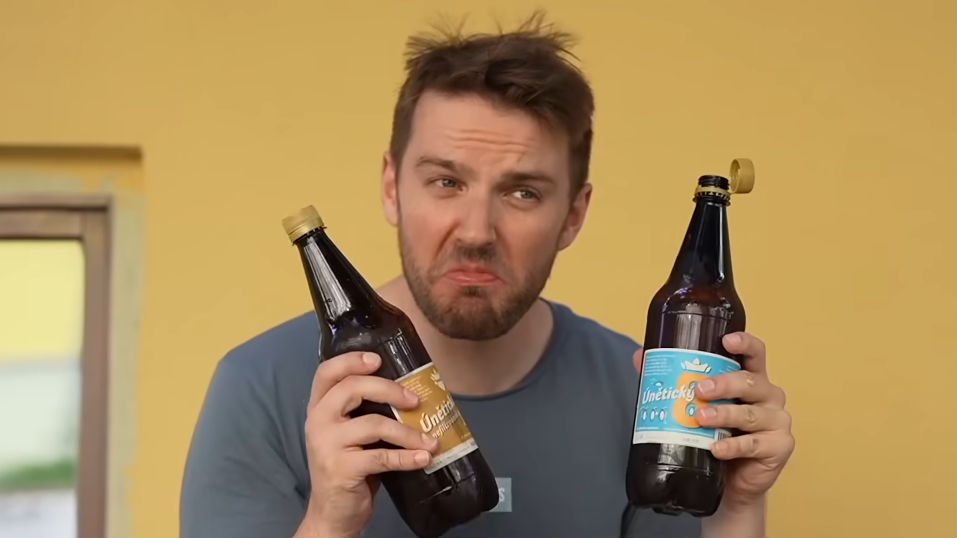Luke Dale holding two beers