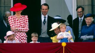 Princess Anne with Prince Harry on the balcony of Buckingham Palace in 1986