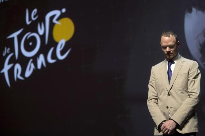 Reigning Tour de France champion Chris Froome on stage for the presentation of the 2014 route