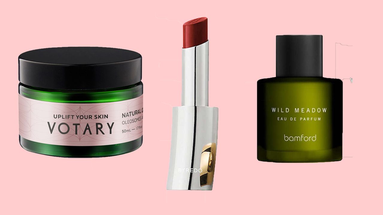 Votary face cream, Byredo Lipstick and Bamford fragrance on a pink background