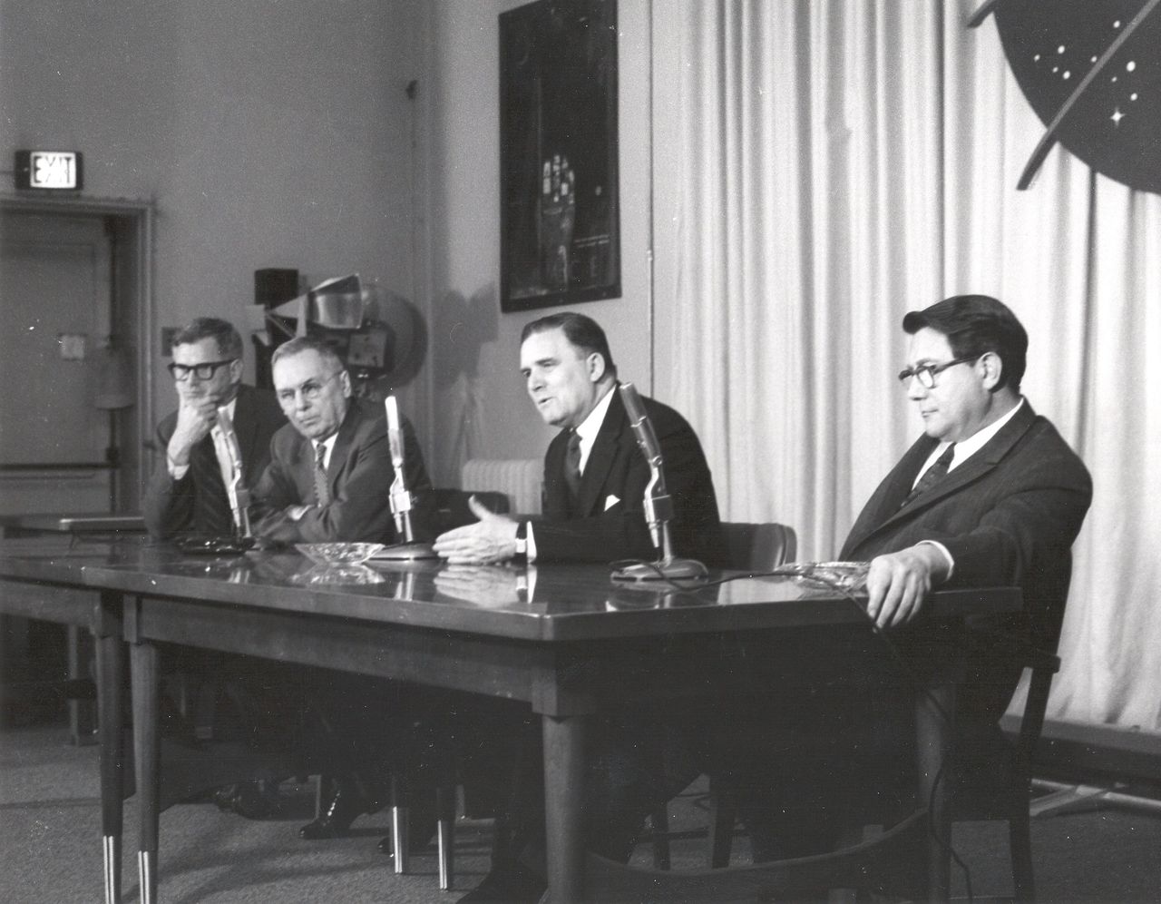 After the successful spaceflight of Yuri Gagarin, the first person to fly in space, as well as orbit Earth, on April 12, 1961 NASA held a press conference at NASA Headquarters in Washington, DC to respond to questions concerning Gagarin's flight and the status of the American space program. From left to right: Dr. Robert C. Seamans Jr., Associate Administrator; Dr. Hugh L. Dryden, Deputy Administrator; Mr. James E. Webb, Administrator; and Dr. Abe Silverstein, Director of Space Flight Programs.