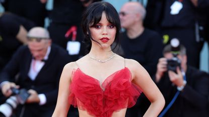 jenna ortega attends beetlejuice opening night in a red wedding dress