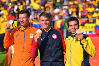 The men's podium of Jelle van Gorkom (Netherlands), Connor Fields (United States) and Carlos Ramirez (Colombia).