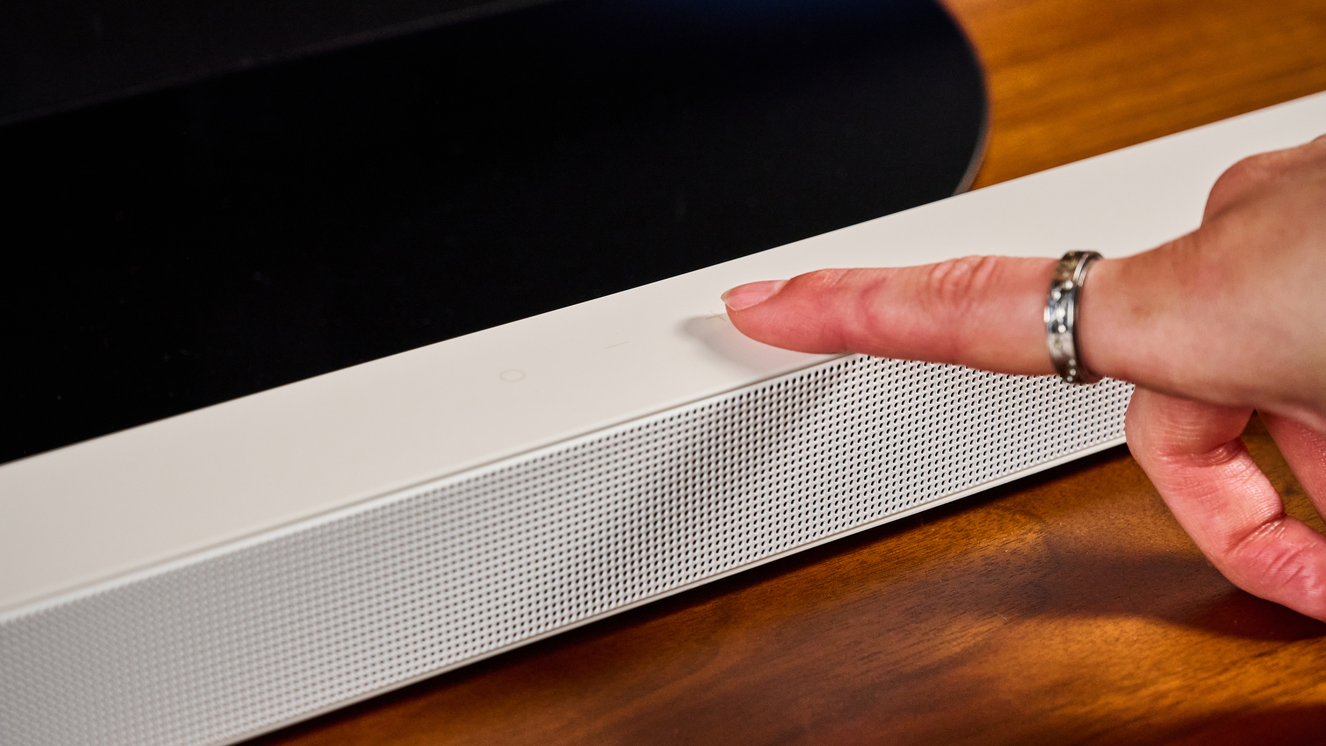 the samsung hw-s801d soundbar and subwoofer in white, an ultra slim soundbar with on-bar buttons, a remote, and separate subwoofer with a black cone