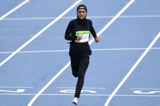 Afghanistan's Kamia Yousufi competes in the Women's 100m Preliminary Round during the athletics event at the Rio 2016 Olympic Games at the Olympic Stadium in Rio de Janeiro on August 12, 2016. / AFP / PEDRO UGARTE (Photo credit should read PEDRO UGARTE/AFP via Getty Images)