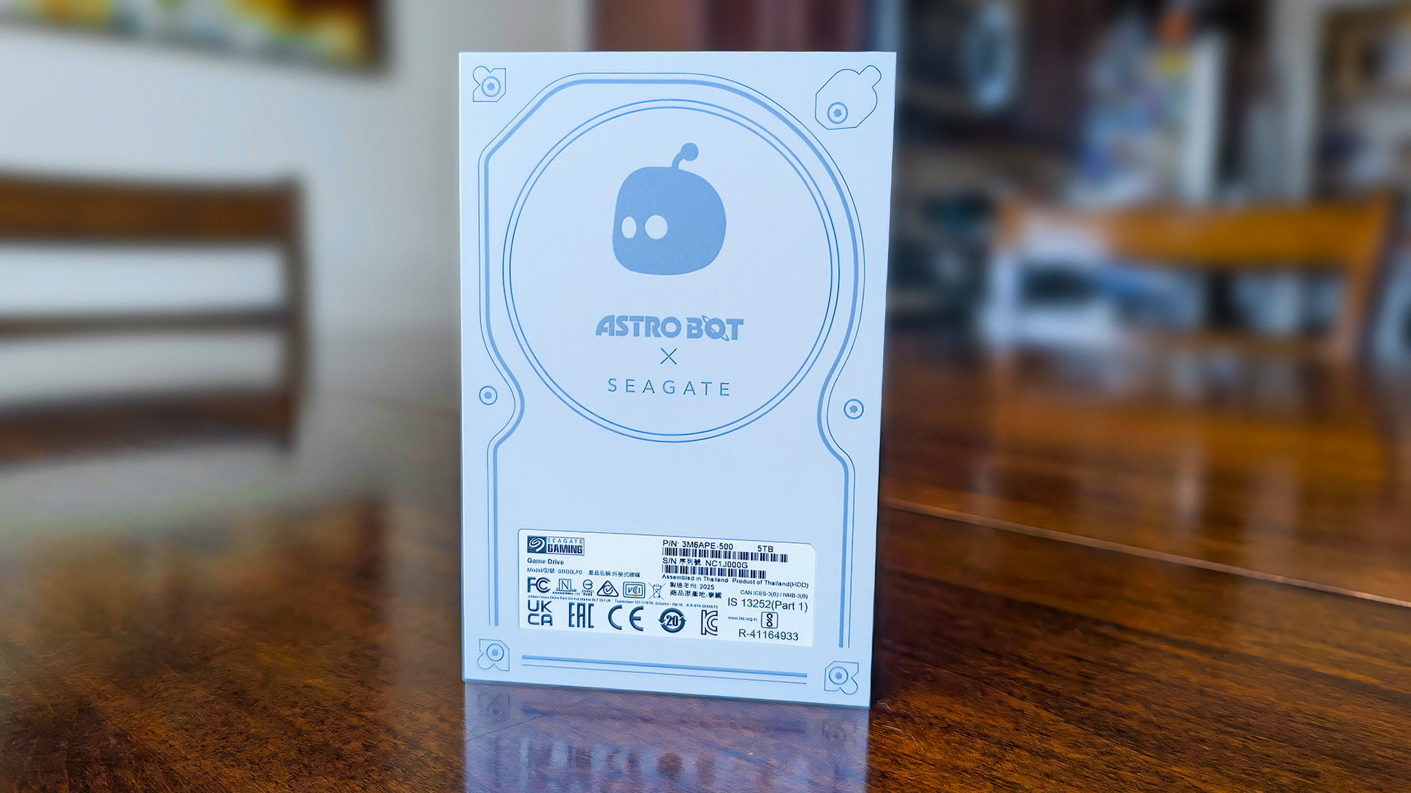 The backside of the Seagate Astro Bot Limited Edition Game Drive with an outline of an HDD and Astro Bot's head.