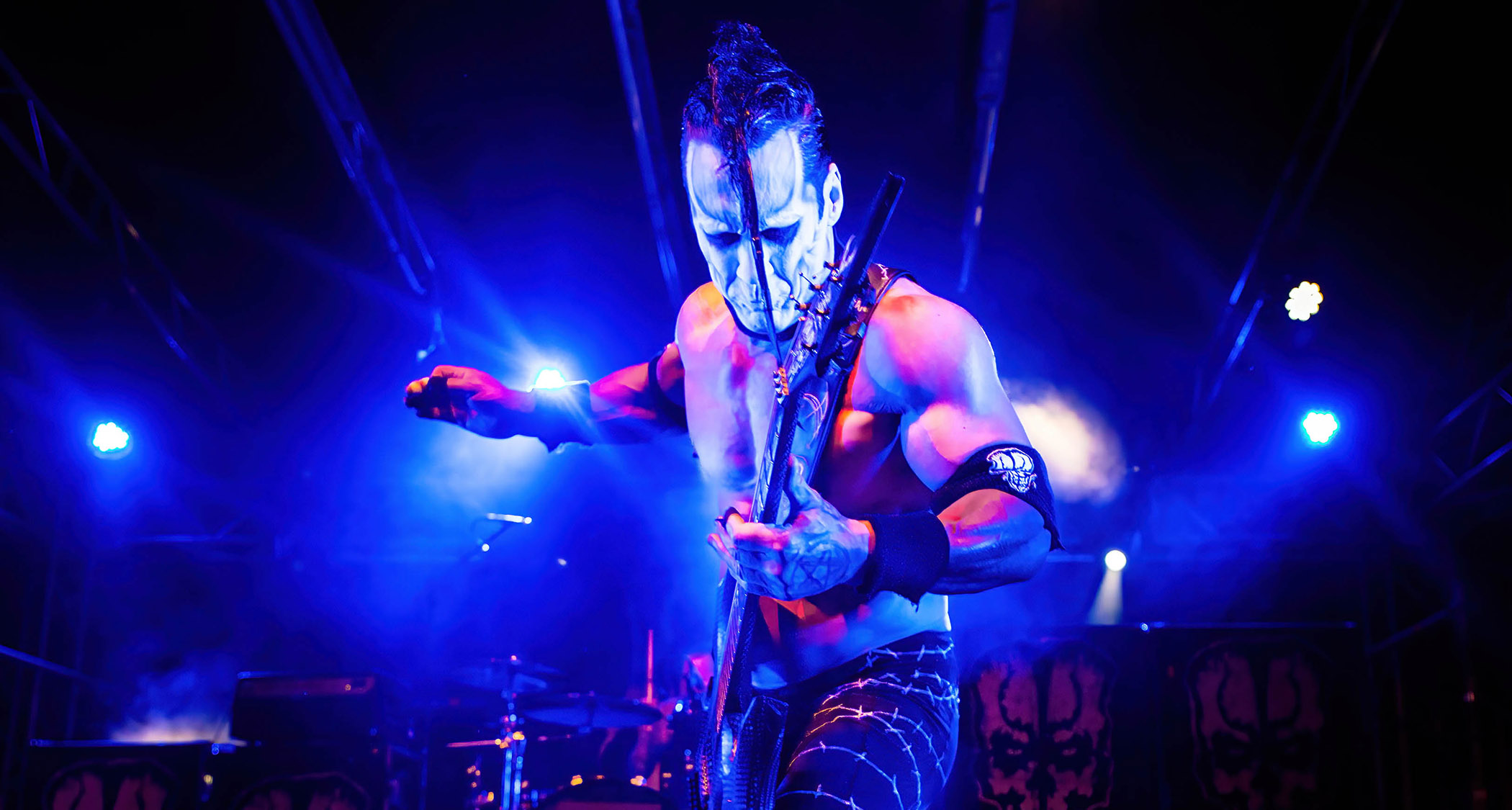 Doyle Wolfgang von Frankenstein, in full war paint, performs with his weaponized electric guitar
