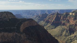 A fighter jet fitted with a gyro-stabilized camera flies close to speed of sound to capture Grand Canyon National Park in a way that it's never been seen before
