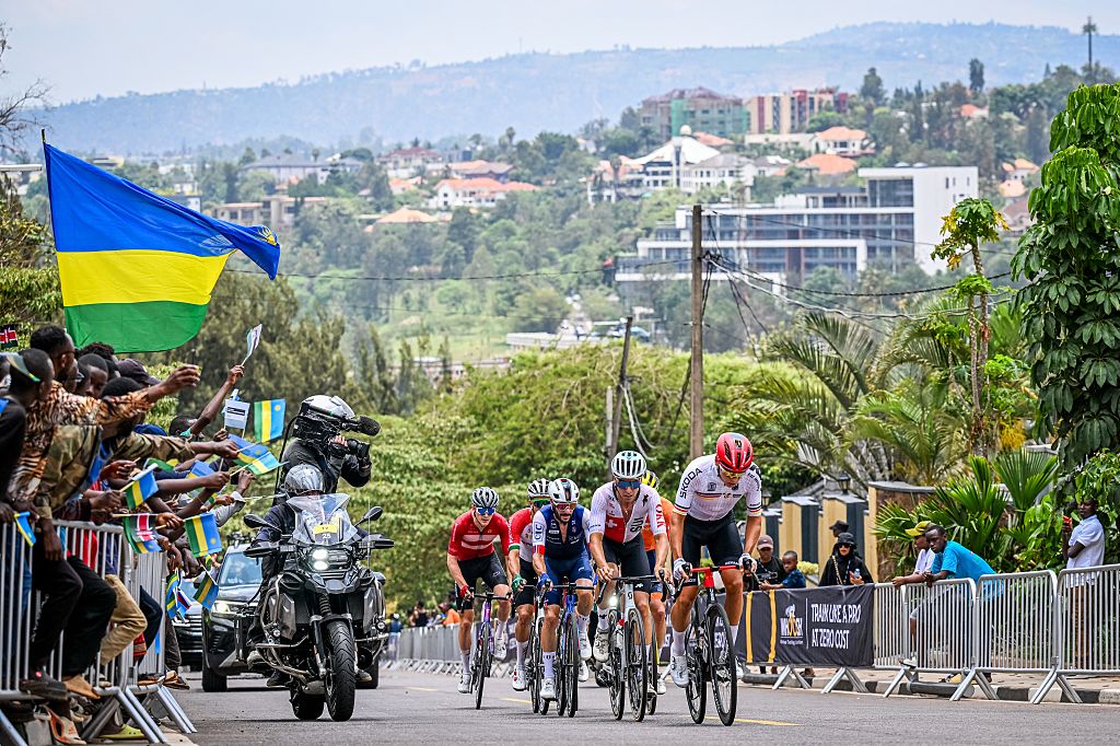 Danish Anders Foldager, Spanish Raul Garcia Pierna, Portuguese Ivo Oliveira, French Julien Bernard, Swiss Fabio Christen and German Marius Mayrhofer pictured in action during the elite men road race (267,5 km) at the cycling road World Championships in Kigali, Rwanda, Sunday 28 September 2025. The 2025 UCI Road World Championships take place from 21 to 28 September in Kigali, Rwanda. BELGA PHOTO DIRK WAEM (Photo by DIRK WAEM / BELGA MAG / Belga via AFP)