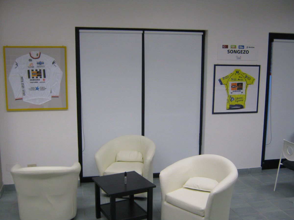 Several jerseys and trophies decorate the lounge area