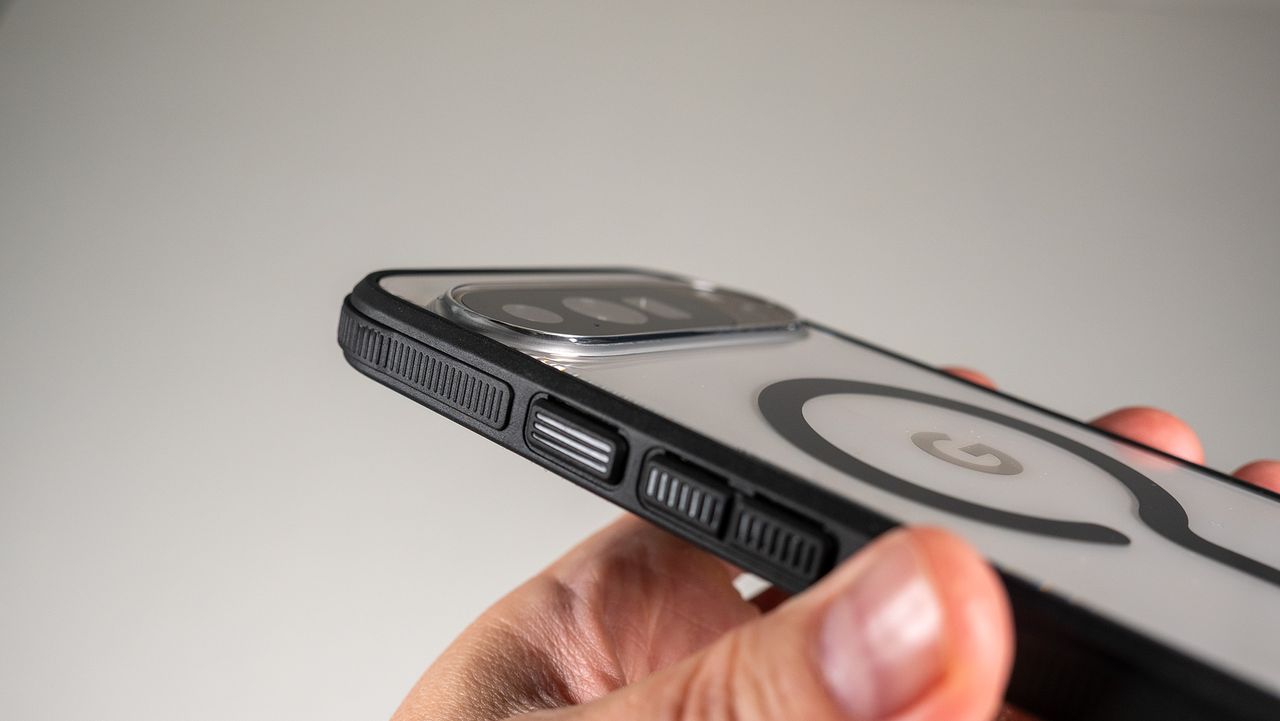 A Dbrand Ghost 2.0 case on a white Google Pixel 10 Pro XL