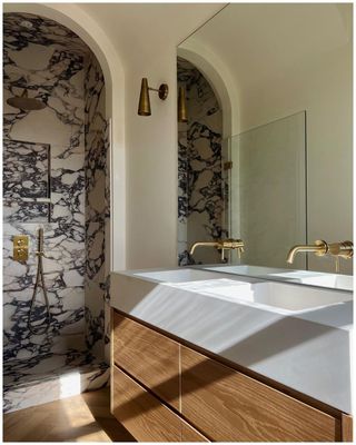 Bathroom with marble wall