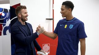 Former England captain David Beckham greets Jude Bellingham during the 2022 World Cup in Qatar.