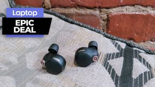  Sony WF-1000XM4 wireless earbuds on a pillow with brick wall background