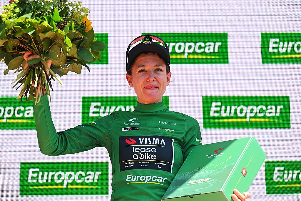 AARBURG, SWITZERLAND - JUNE 20: Femke de Vries of Netherlands and Team Visma | Lease a Bike celebrates at podium as Green Mountain Jersey winner during the 89th Tour de Suisse 2026, Stage 4 a 23.7km individual time trial stage from Aarburg to Aarburg / #UCIWT / on June 20, 2026 in Aarburg, Switzerland. (Photo by Tim de Waele/Getty Images)