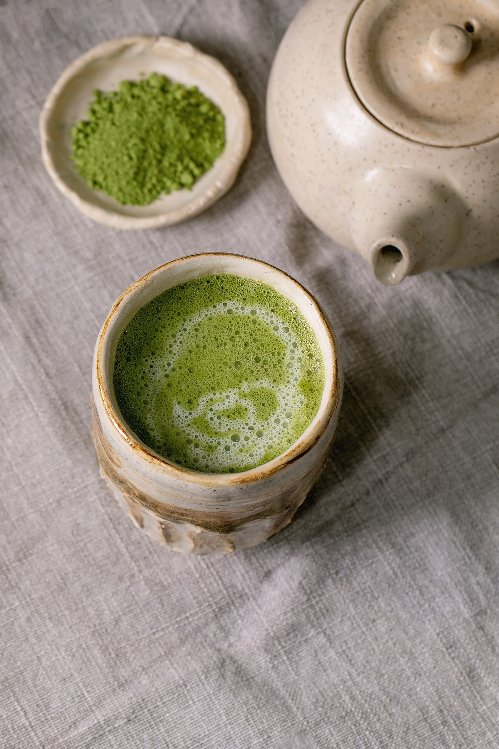 Matcha latte in earthenware mug