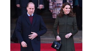 Britain's Prince William, Duke of Cambridge, (L) and Britain's Catherine, Duchess of Cambridge (R) leave after visiting City Hall in Centenary Square, Bradford on January 15, 2020, to meet young people and hear about their life in Bradford. (Photo by Oli SCARFF / AFP) (Photo by OLI SCARFF/AFP via Getty Images)