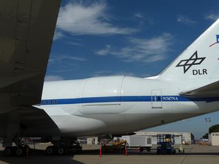 When SOFIA is aloft, the large door on its left side opens, expo