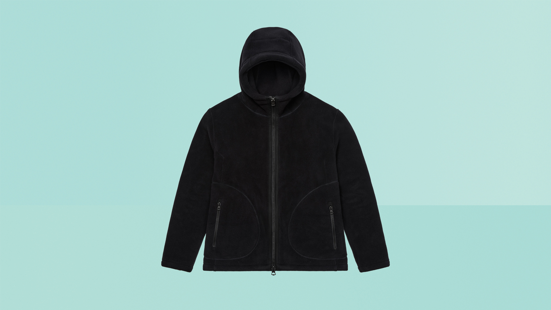 Vollebak Deep Sea Diver Hoodie on green background