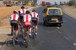 The Radioshack riders take on the local traffic on a training ride