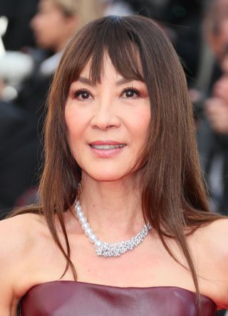 Michelle Yeoh attends the "Horizon: An American Saga" Red Carpet at the 77th annual Cannes Film Festival at Palais des Festivals on May 19, 2024 in Cannes, France