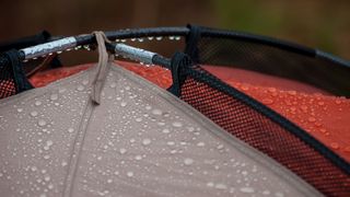 how to pitch a tent in the rain: rainfly with water beading
